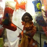 One of the squillion Befanas swarming the stores.  Snaggly teeth: check. Broomstick: check. Stockings crammed with candy: check. She's good to go.