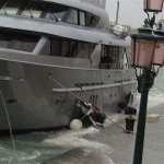 I have the utmost respect for the fact that they were giving it all they had to protect the boat (though then again, why it took them so long to remember the fenders is a mystery.  The high-water siren sounded at 6:00 AM and it's now 9:30.) Instinct clearly has taken over, because two people with a combined weight of perhaps 300 pounds couldn't possibly shift an object weighing at least a ton being pushed by the combined strength of Poseidon and Aeolus. I hope they're okay today.  I hope they didn't get fined, or fired, when the boss checked up on them.