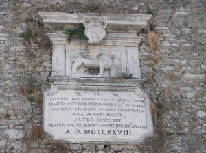 A plaque on an external wall of the New Fortress records in Latin that the work of fortification was completed in 1728 by Marco Antonio Diedo and Giorgio Grimani, under Doge Alvise III Mocenigo.  The winged lion of San Marco naturally seals the declaration.