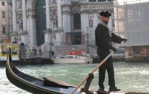 There are still some gondoliers who dress perfectly, down to the traditional beret with pompom.  Until the Sixties, gondoliers always wore a black wool beret in the winter, and a white cotton version in summer.  The now-ubiquitous straw hat -- once normally seen on farmers gathering snails - is now worn year-round, from blazing summer heat to winter fog, rain and snow.