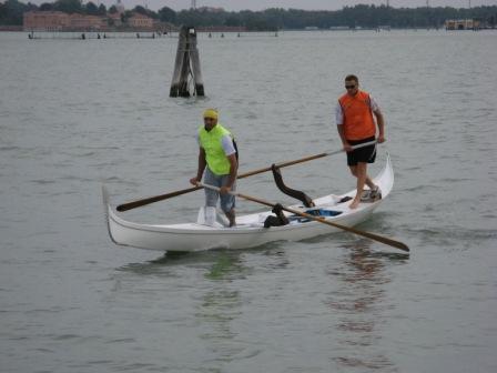 Martino Vianello and Andrea Bertoldini, training on their gondolino three months before the big race.  Clearly a boat that doesn't play games.