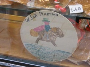 A child's version of events painted on a plate which says "Viva San Martino" (long live St. Martin).  I think he might have liked this blithe little version of events.