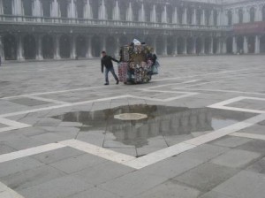 Acqua alta doesn't necessarily have to come pouring over the battlements.  As here in the Piazza San Marco, it often comes up through the drains.