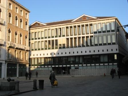 This is the headquarters of the Cassa di Risparmio di Venezia (Venice Savings Bank) in Campo Manin.  They say it's called Palazzo Nervi-Scattolin, but it doesn't resemble anything like what most people would call a Venetian palace.