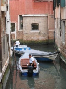 There have always been large heavy boats moving materials in Venice, but when they were propelled by oars, the backing-and-forthing needed to negotiate spaces and corners didn't involve creating heavy vortexes of water.