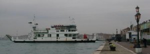 One of the regular car ferries is engaged for the carnival trucks.