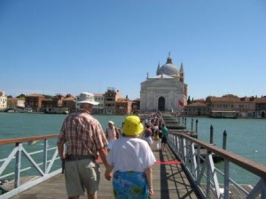 Crossing the votive bridge from the Zattere to the Giudecca, to the very feet of the church of the Most Holy Redeemer, always touches me.