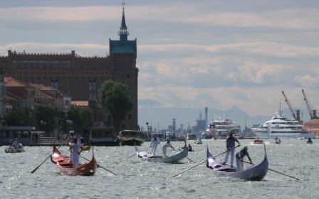 Three of the nine gondolas begin to warm up, and head for the starting line.