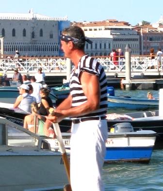 The phenomenal Franco Dei Rossi, known as "Strigheta," finished fourth in the 34th year he's rowed this race.  You cannot tell me that that is the arm of a 56-year-old man.  And yet, it is.