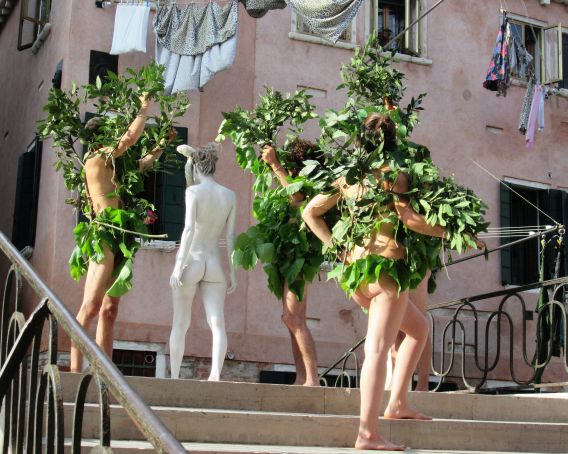 I was startled -- as was everyone else in the neighborhood -- to come across this extraordinary quintet on our very own little bridge.  You think this is about naked and semi-naked people posing in public?  Peasant!  It's a Protest, of course! 